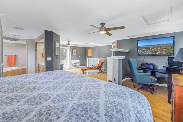 bedroom with ornamental molding, hardwood / wood-style floors, and ceiling fan