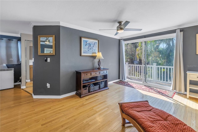 540 Villagrande Ave S, Saint Petersburg, FL 33707 - living area with hardwood / wood-style flooring, ornamental molding, and ceiling fan