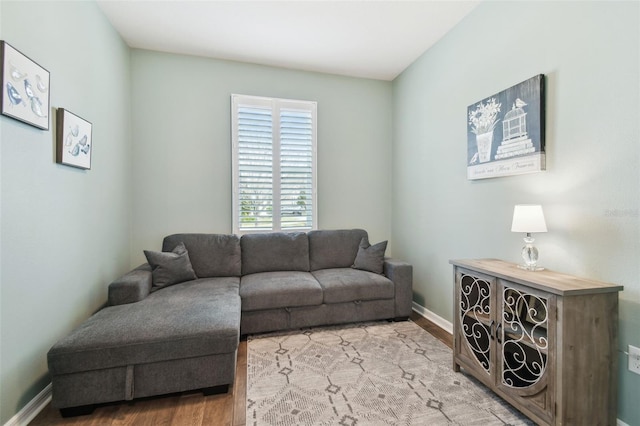 living room with light hardwood / wood-style floors