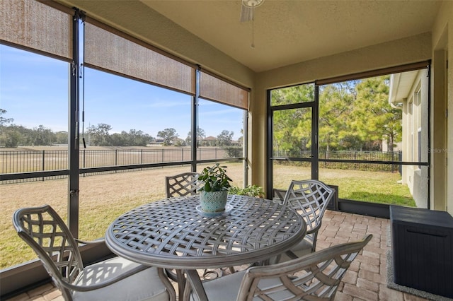 sunroom with a rural view