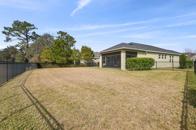 view of yard featuring a sunroom