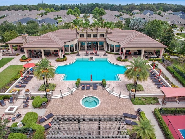 view of swimming pool with a gazebo, a hot tub, and a patio