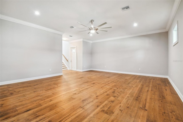 unfurnished room featuring ornamental molding, light hardwood / wood-style floors, and ceiling fan