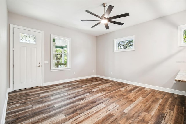 entrance foyer featuring ceiling fan and dark hardwood / wood-style flooring