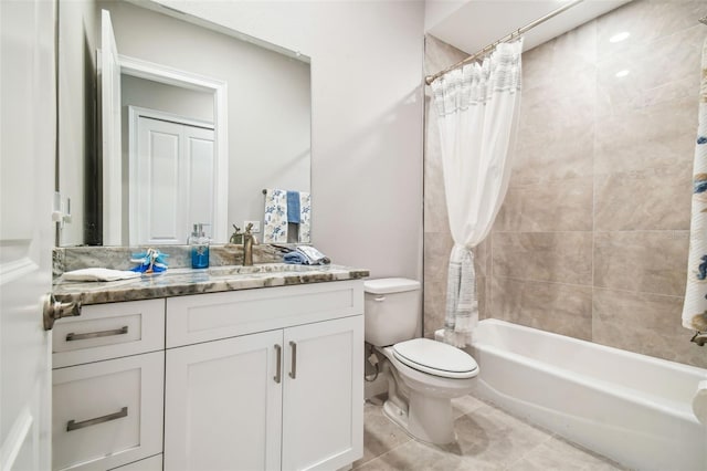 full bathroom featuring vanity, shower / bath combo, tile patterned floors, and toilet