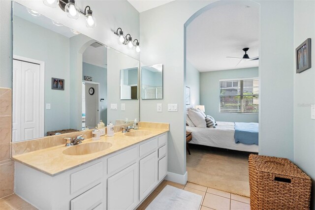 bathroom featuring vanity, tile patterned floors, and ceiling fan