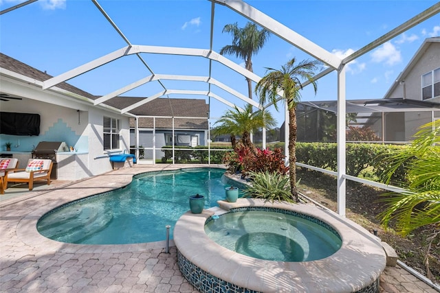 view of pool featuring an in ground hot tub, a lanai, and a patio area