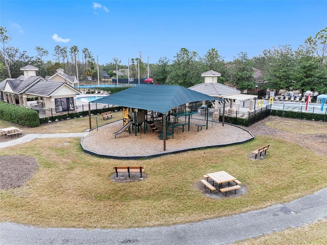 view of playground with a yard