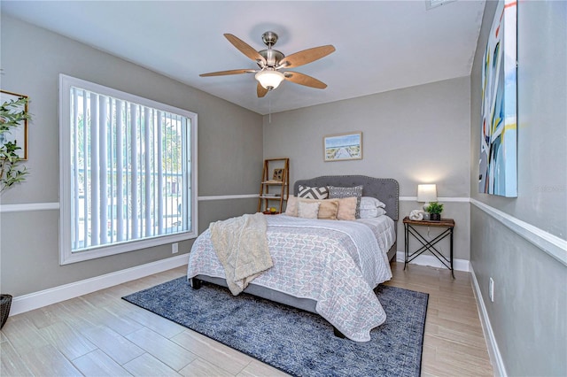 bedroom featuring ceiling fan and light wood-type flooring