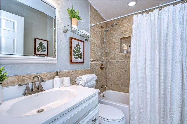 full bathroom featuring vanity, toilet, and shower / bath combo with shower curtain