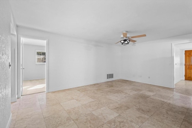 spare room featuring ceiling fan