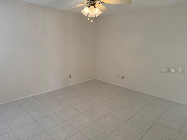 spare room featuring ceiling fan