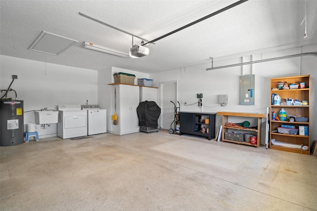 garage featuring a garage door opener, sink, washer and dryer, electric panel, and water heater