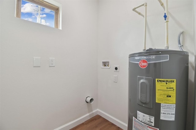 utility room with electric water heater