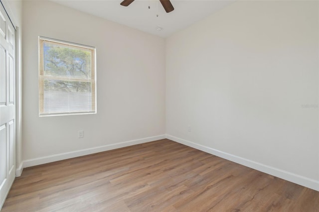 unfurnished room featuring light hardwood / wood-style floors and ceiling fan