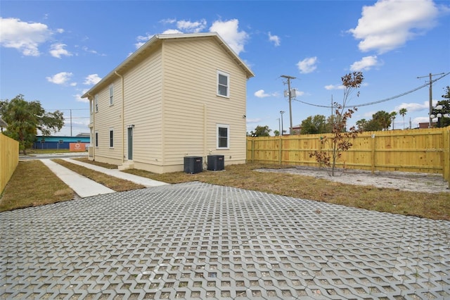 view of home's exterior featuring cooling unit