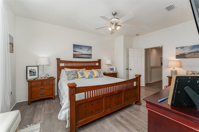 bedroom featuring ceiling fan and light wood-type flooring