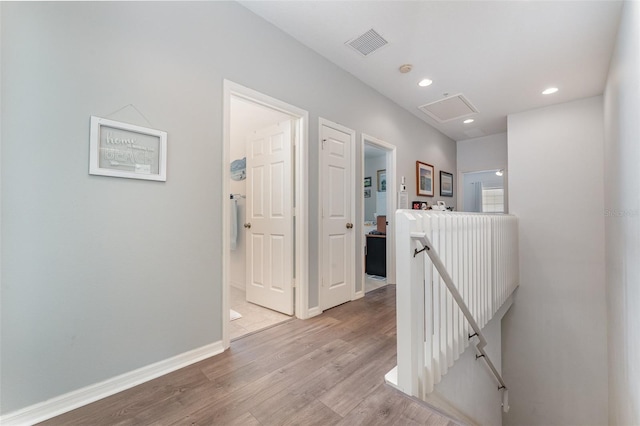 hallway featuring light hardwood / wood-style floors