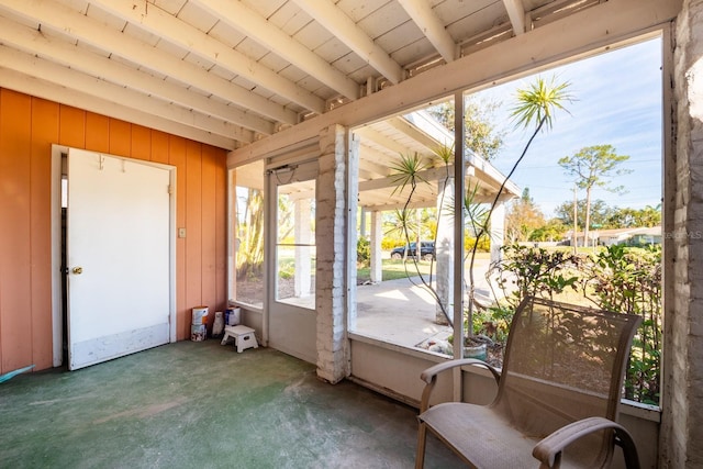 sunroom / solarium with beam ceiling