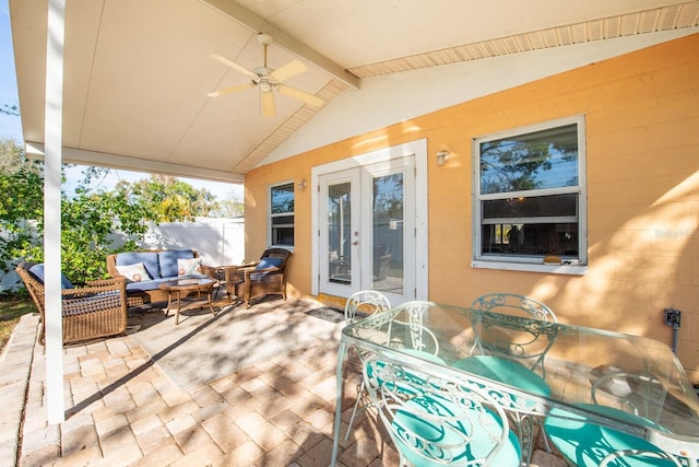 view of patio featuring french doors, ceiling fan, and outdoor lounge area