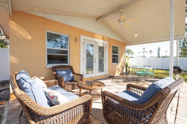 view of patio featuring french doors, ceiling fan, and outdoor lounge area