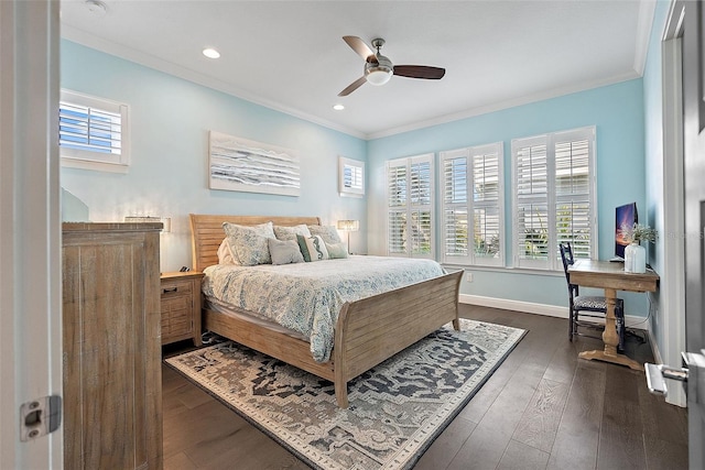 bedroom with crown molding, dark wood-type flooring, and multiple windows