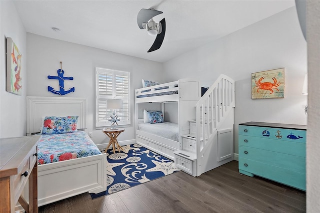 bedroom with dark wood-type flooring and ceiling fan