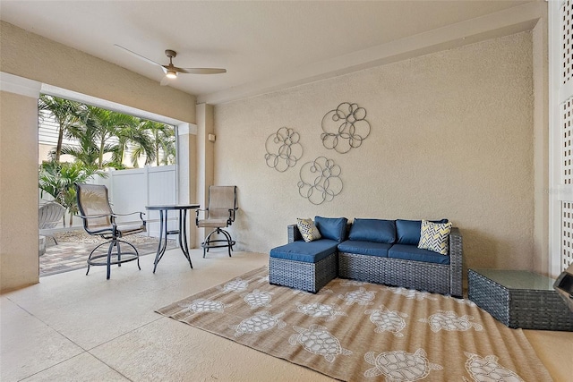 living room with ceiling fan