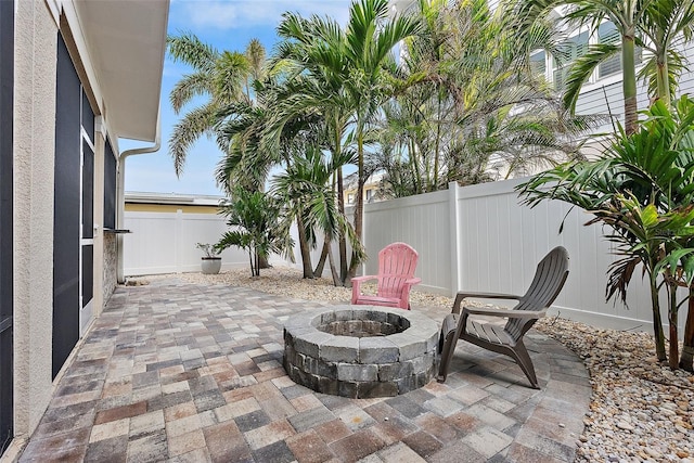 view of patio featuring an outdoor fire pit