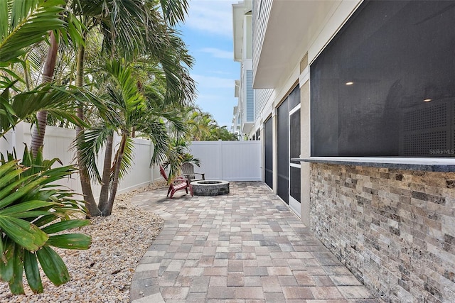 view of patio featuring a fire pit