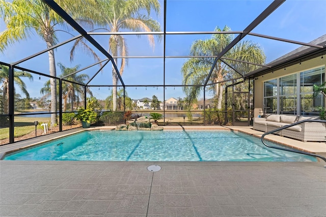 view of swimming pool with a lanai, an outdoor hangout area, and a patio