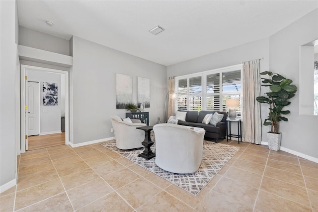 living room featuring light tile patterned floors