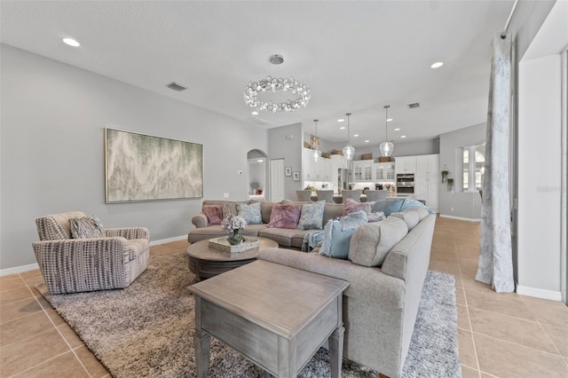 living room featuring light tile patterned flooring