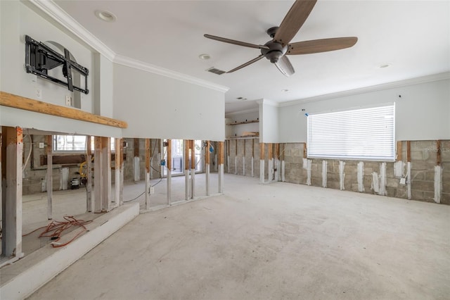 unfurnished room featuring ornamental molding and ceiling fan