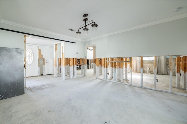 spare room featuring crown molding