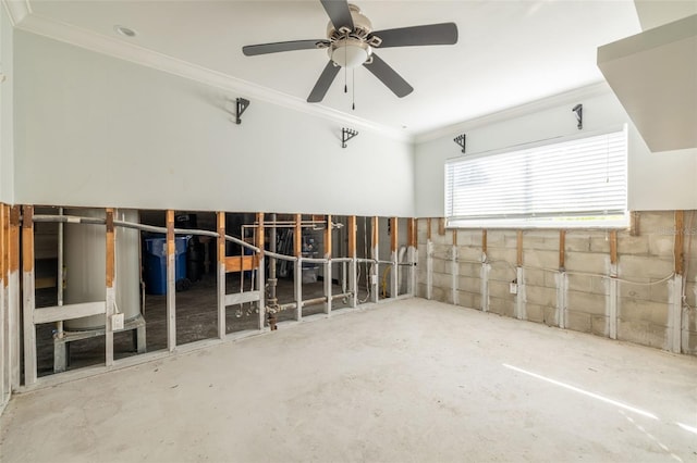 interior space featuring concrete flooring, ornamental molding, and ceiling fan