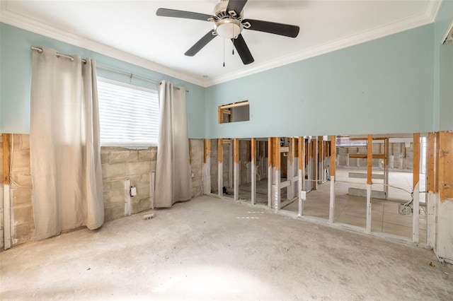 interior space featuring ceiling fan and ornamental molding