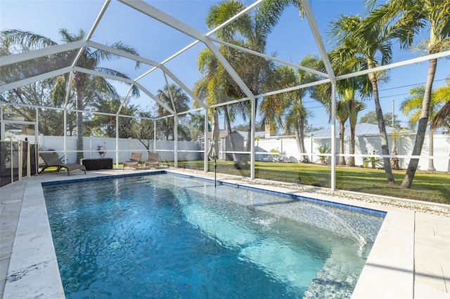 view of swimming pool with a lanai and a patio