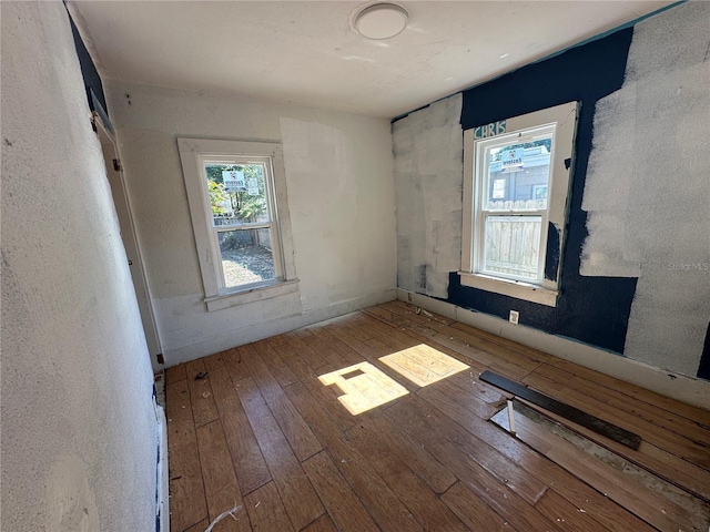 spare room with light wood-type flooring