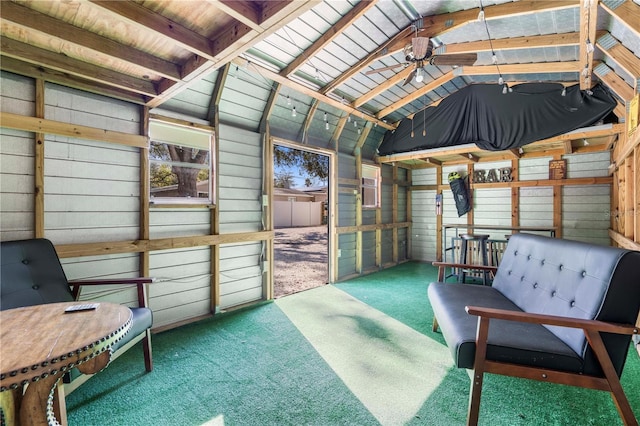 interior space featuring ceiling fan