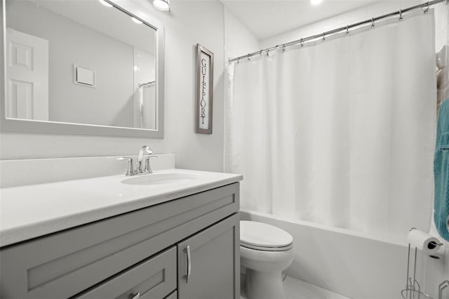 full bathroom featuring vanity, toilet, and shower / bathtub combination with curtain