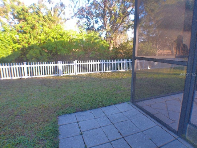 view of yard featuring a patio area and fence