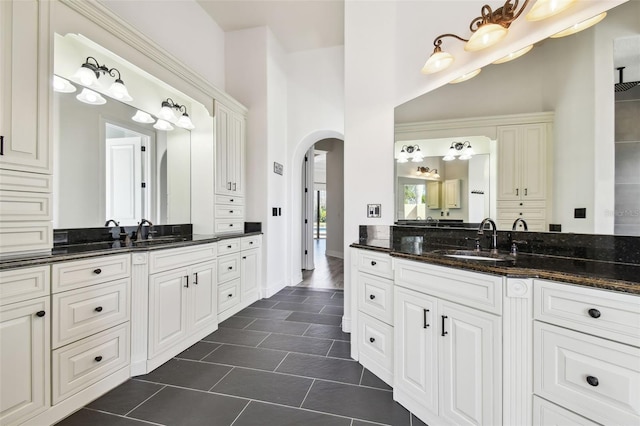 bathroom with vanity and tile patterned flooring