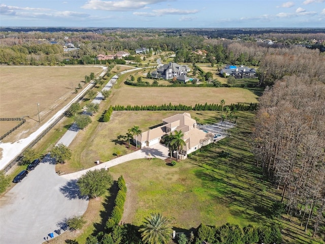 birds eye view of property featuring a rural view