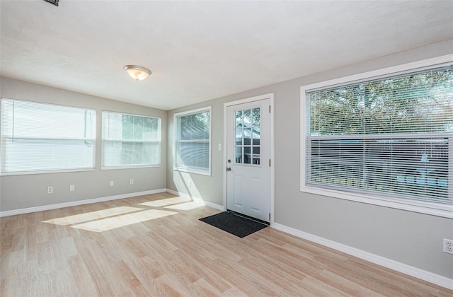 doorway featuring light hardwood / wood-style flooring