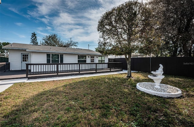 view of yard featuring a wooden deck