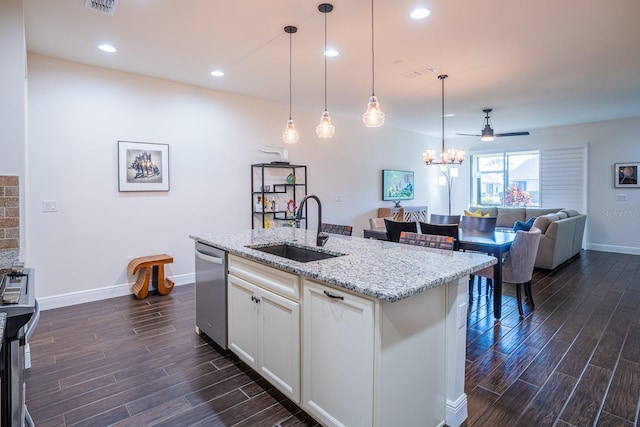 kitchen with sink, white cabinetry, dishwasher, an island with sink, and light stone countertops