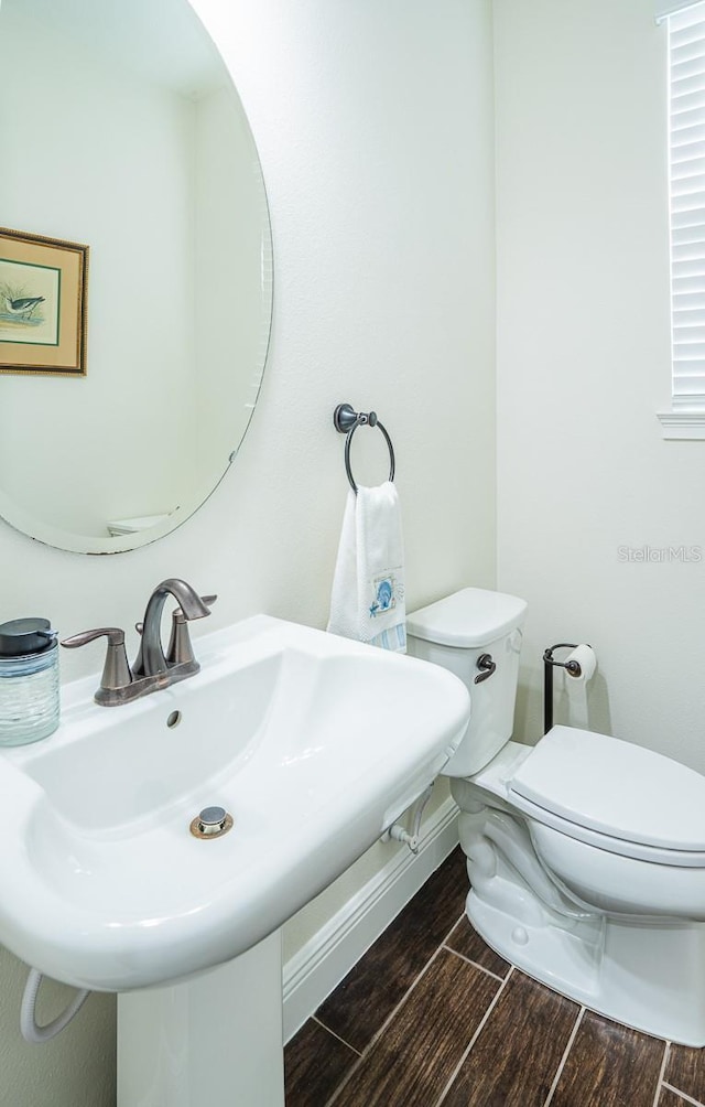 bathroom with sink and toilet