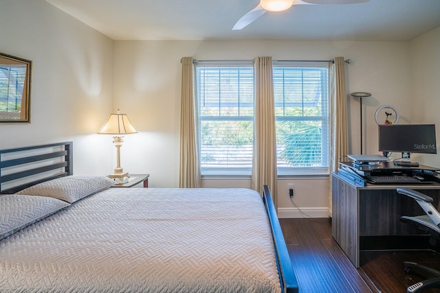 bedroom featuring ceiling fan and dark hardwood / wood-style flooring