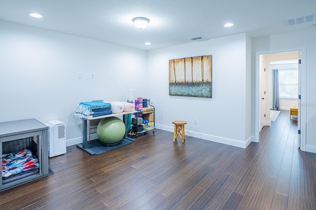 interior space with dark hardwood / wood-style flooring